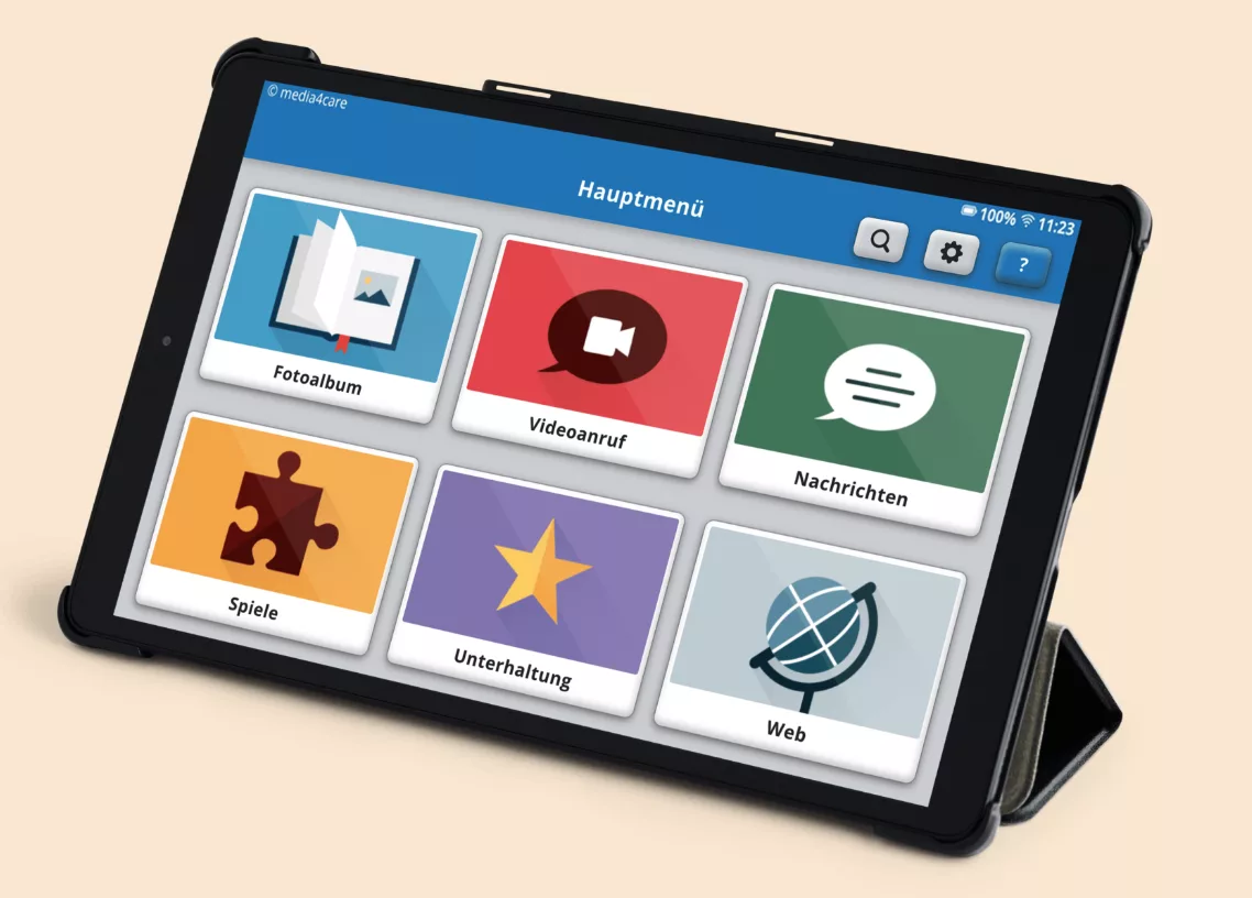 Media4Care Tablet mit Aktivierungs- und Kommunikationsoberfläche